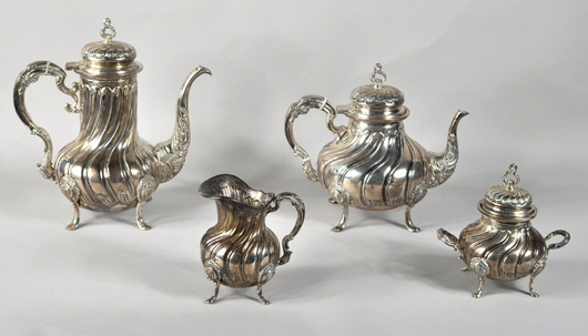  Four-piece sterling silver tea or coffee set: $3,565. Woodbury Auction image.